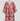 Addison Dress in multicolor tropical print hanging on rack.