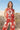 Akiabara Set worn by model, front view, red printed sleeveless set with relaxed fit