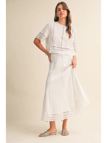 Amirkat Set white lace crop top and midi skirt set front angle showing soft silhouette and lightweight fabric movement