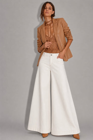 Annalise Wide Leg Palazzo Jeans in white featuring a high-rise waist, oversized palazzo legs, structured denim, classic five-pocket design, and a full-length wide hem.