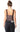 Atta Bodysuit back view showing sheer black lace corset bodysuit with structured shaping and slim straps, styled with black jeans, photographed in studio lighting for full silhouette detail.