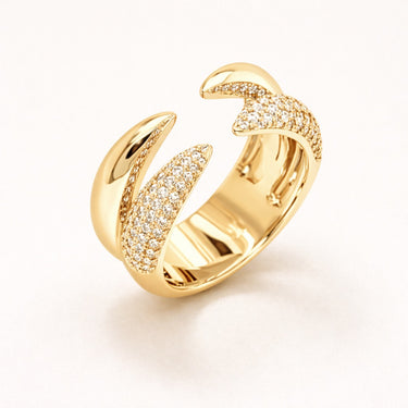 Baies Ring sculptural open pavé ring with curved organic design and shimmering stones in gold finish on neutral background