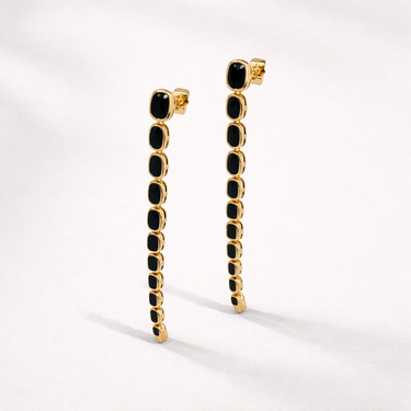 Blow Stud Earrings gold drop earrings with black stones in linear design, modern statement earrings.
