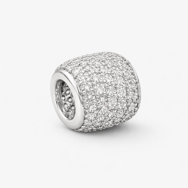 Carmela Charm silver crystal charm close-up with full pavé zirconia stones on curved cylindrical silhouette on light neutral background with soft shadow