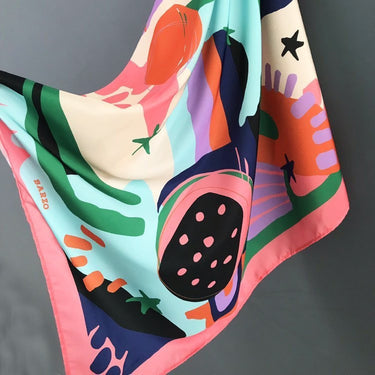 Cézanne Scarf with multicolor artistic print in pastel, coral, and mint tones, silky fabric draped on neutral background, part of Matte Wrap It Up Collection.