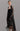 Chalat Kimono worn by model, front view, featuring metallic crochet open-knit design and long fringe detail.