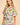 Model wearing the Enus Top in abstract print cotton with short balloon sleeves and relaxed fit.