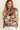 Bold knit design of the Eon Sweater with vibrant color waves.