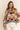 Oversized Eon Sweater with V-neckline, styled with white denim.