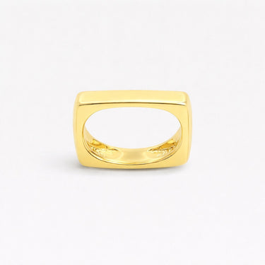Esther Ring gold rectangular hollow statement ring on neutral background