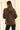 Back view of women's leopard print blazer showing the tailored silhouette, allover animal print, and ruched sleeves.