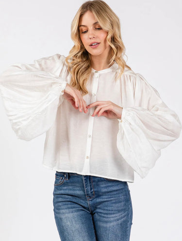 Model wearing the Giselle Blouse showing the puff of the sleeves.