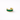 Gold ear cuff with green gemstones on a white background