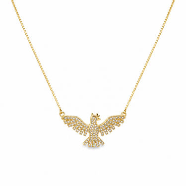 Grim Necklace gold phoenix pendant on neutral background, highlighting winged design and clear shimmering stone details.