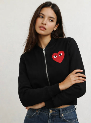 Iplo Zipper Jacket worn on model featuring cropped bomber fit with heart detail on front.