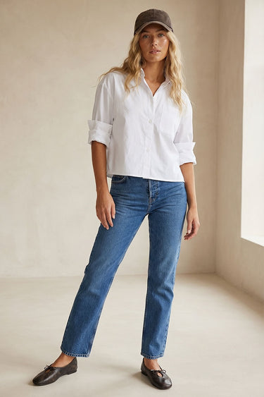 Lad Shirt white cotton shirt full-body outfit view with jeans and casual styling.