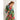 Lein Shirt styled with a vibrant tropical print and tie-front button-down design