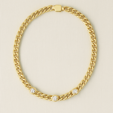 Gold chain necklace with zirconia accents on neutral beige background – Lyric Necklace by Matte