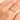Gold Freshwater Pearl Ring with Five Pearls worn on hand – delicate gold band with small white pearls on finger, minimal jewelry styling close-up