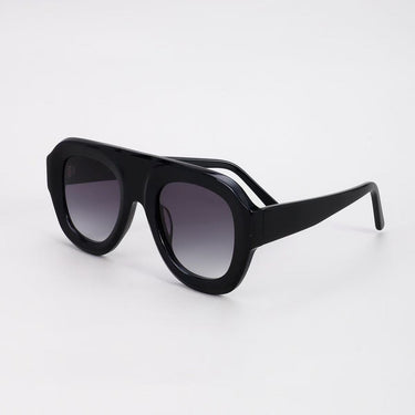 Mirage Sunglasses black oversized sunglasses thick frame bold modern fashion eyewear product shot.
