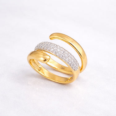 Morris Ring in gold featuring a wide polished band with a central row of pavé cubic zirconia, set on a soft light gray background with subtle shadow