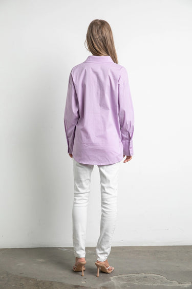 Back view of Noema Lilac Shirt in cotton with long sleeves and straight fit.