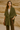 Quiton Poncho Cape — olive green ribbed knit wrap with self-tie front, shown on model, cozy fall accessory from Matte.