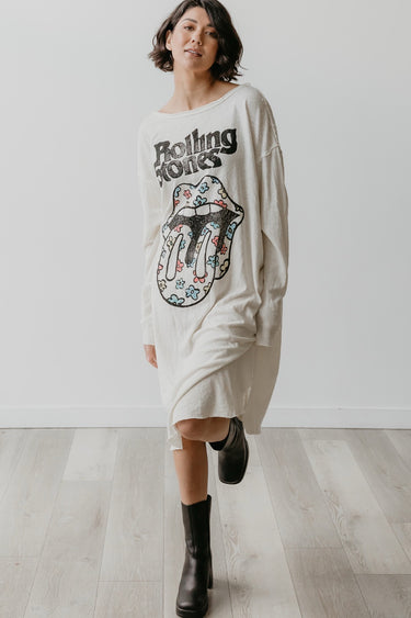 Oversized Rolling Stones dress styled with boots, casual streetwear outfit.