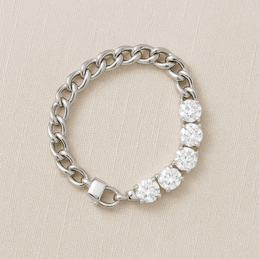 Silver chain bracelet with gold-filled zirconia accents on a neutral beige background – Sabine Bracelet by Matte