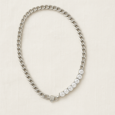 Silver chain necklace with alternating gold-filled zirconia links on a neutral linen background – Sabine Necklace by Matte