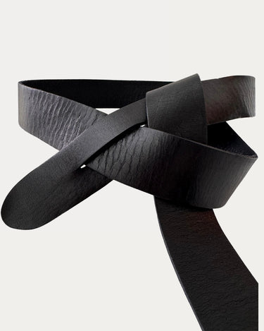 Close-up of the Scarlet Knot Belt in black, handcrafted from Argentinian leather with wrap knot design