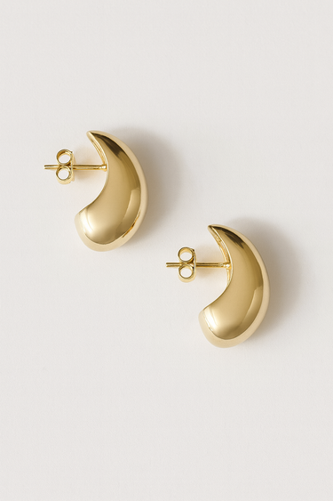 Sculpted Dome Earrings — gold-plated curved dome earrings with mirror-like shine on white background, bold and elegant by Matte.