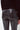 Back view of black sequin flare pants with flattering fit and metallic shine, statement partywear bottoms