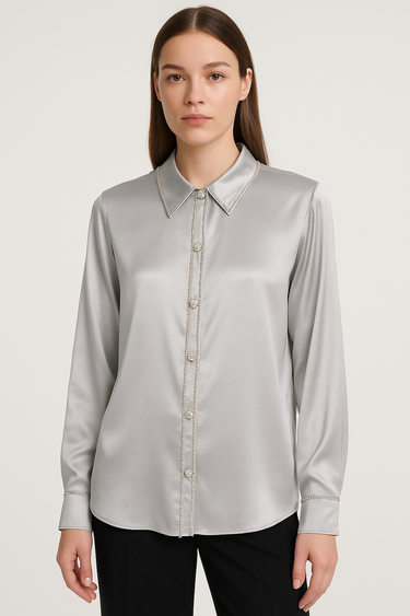 Model wearing the Soho Blouse in gray — satin-finish fabric, button-down front, long sleeves, pointed collar, elegant minimalist style.