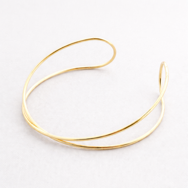 Tica Arm Cuff minimal gold upper arm bracelet soft curved open cuff design.