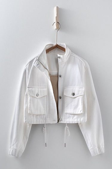White cropped utility jacket with drawstring hem and front pockets.