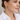 Vael Stud Earrings worn on model showing curved ear-hugging silhouette