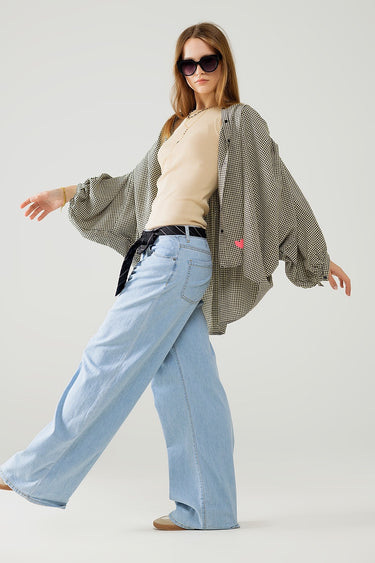 Zaria Jeans light-wash wide-leg denim styled casually on model