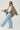 Zaria Jeans light-wash wide-leg denim styled casually on model