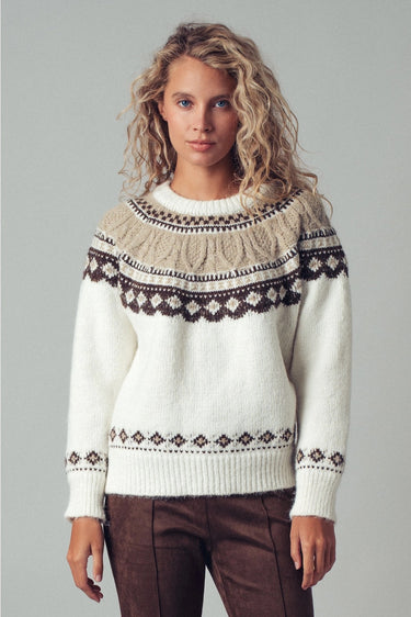 Back view of Zermatt Sweater, fair isle knit in cream with taupe and brown yoke, styled with brown pants.