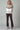 Model wearing cream knit with taupe and brown fair isle