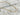 Albacete Necklace by Matte, gold plated chain necklace displayed on marble tile background