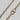 Allison necklace by Matte, gold plated chain necklace with 18″ length displayed on stone background