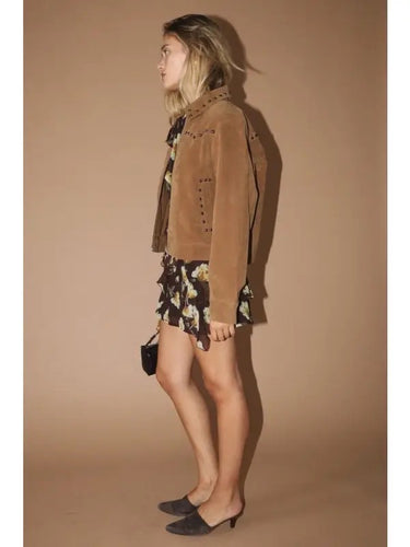Side view of the Amirk Jacket highlighting the structured silhouette, soft faux suede texture, long sleeves, and lightweight layering design.