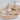 Anastacia gold-filled chunky necklace displayed on a wooden stand by Matte