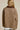 Back view of the Aspen Utility Jacket displaying the oversized silhouette, clean back construction, dropped shoulders, and mocha brown fabric.