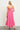 Back view of Ainsley Pink Midi Dress showing relaxed fit and flowy texture.