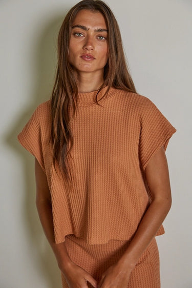 Barbara Top terracotta textured waffle knit top with relaxed oversized fit front view.