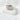 Silver double-band statement ring with sculptural shape on marble base – Big Shot Ring by Matte.