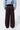 Back view of Lisboa Pants showing relaxed wide-leg fit.